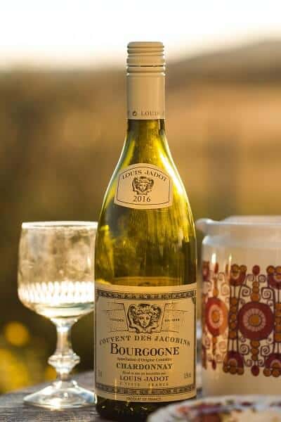 Bottle of French AOC White Wine with Glass