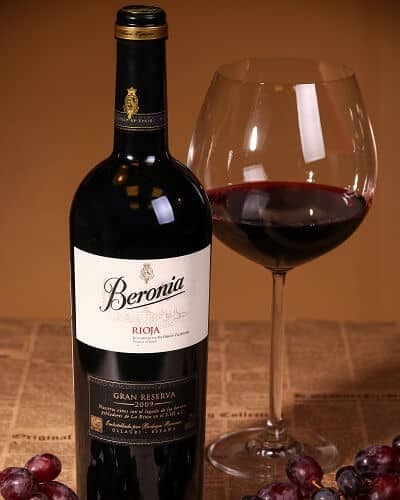 Bottle and Glass filled with Rioja Wine