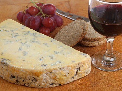 Glass of Port Wine and Slice of Stilton Cheese