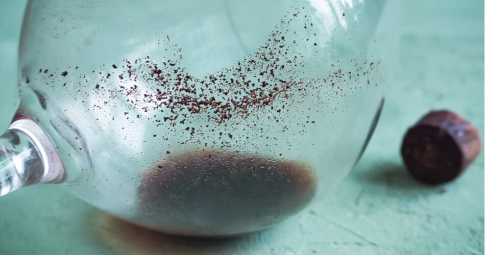 Close Up of Red Wine Sediment in Wine Glass