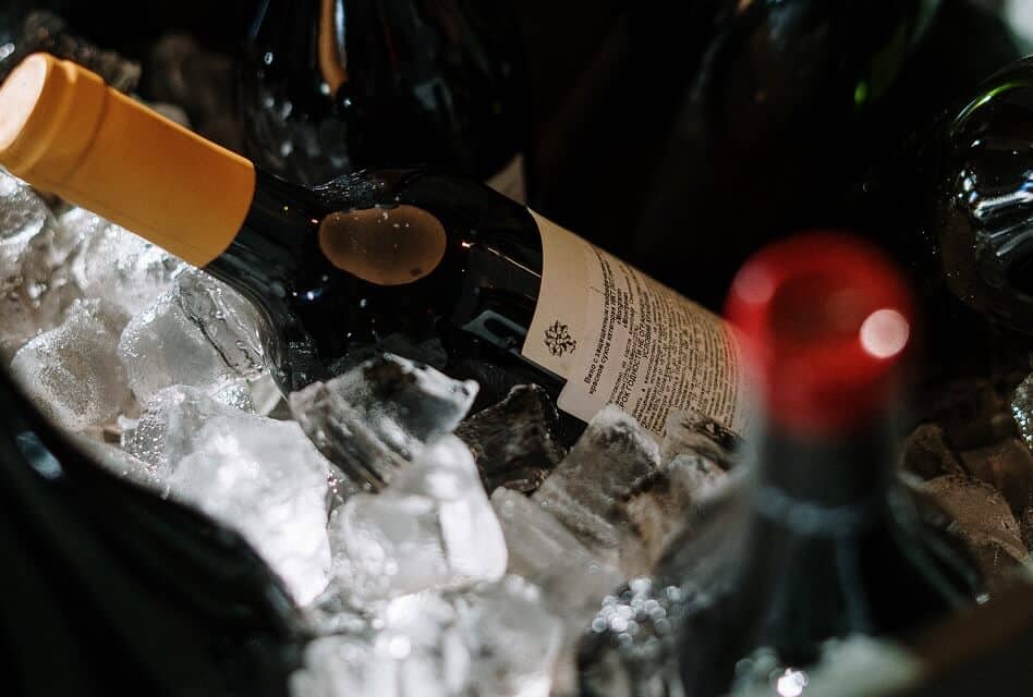 Bottle of Wine Freezing in Ice Cube